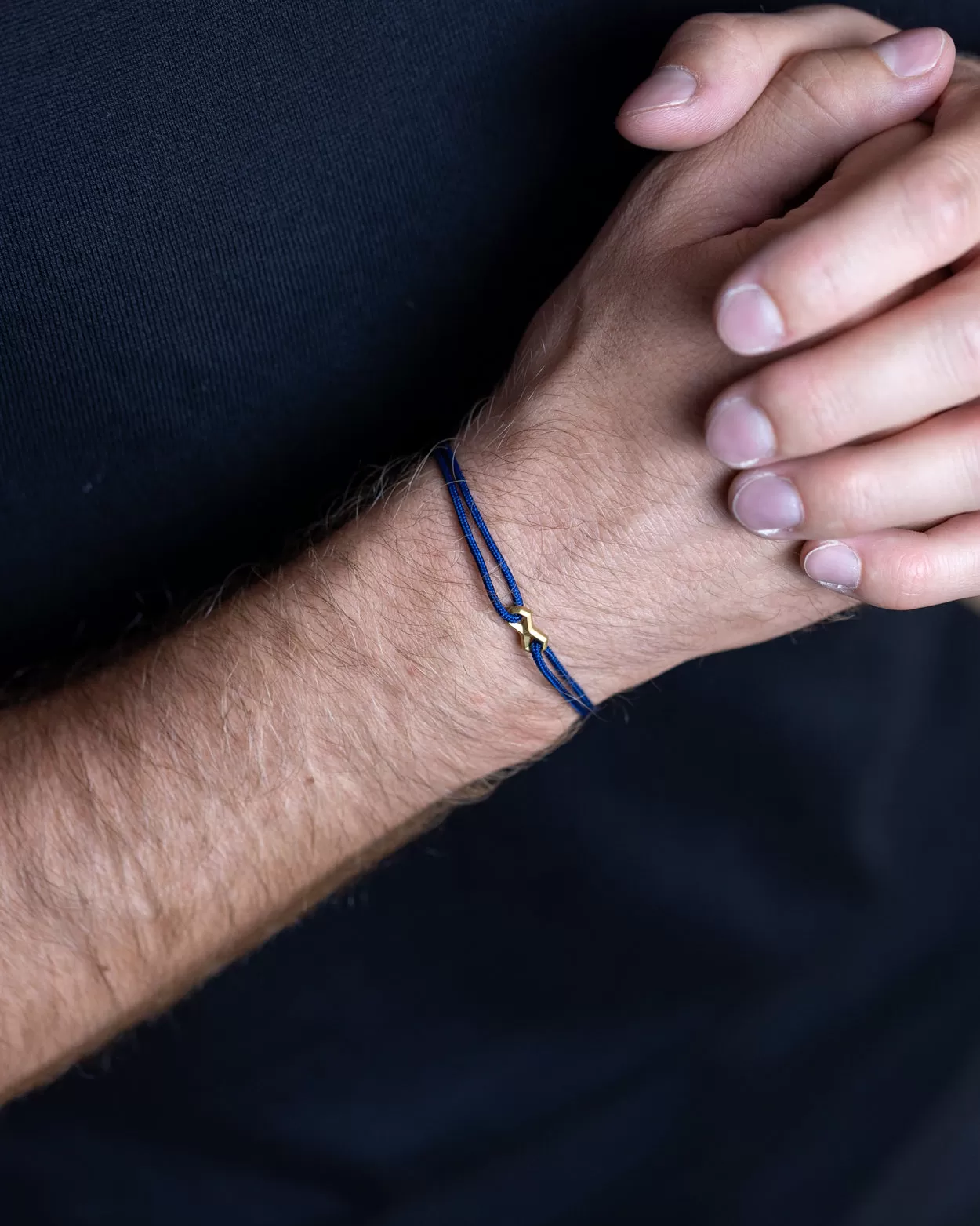 1.5mm Blue nylon bracelet with a gold-plated Infinity sign